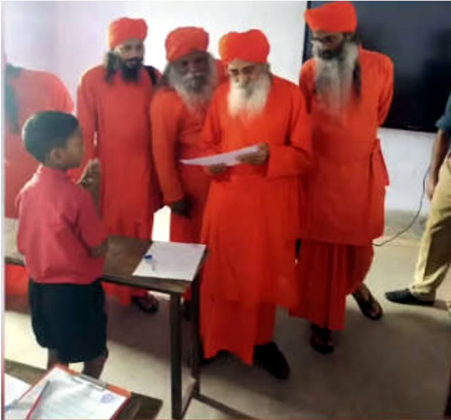 Acaryas gathered with a young student